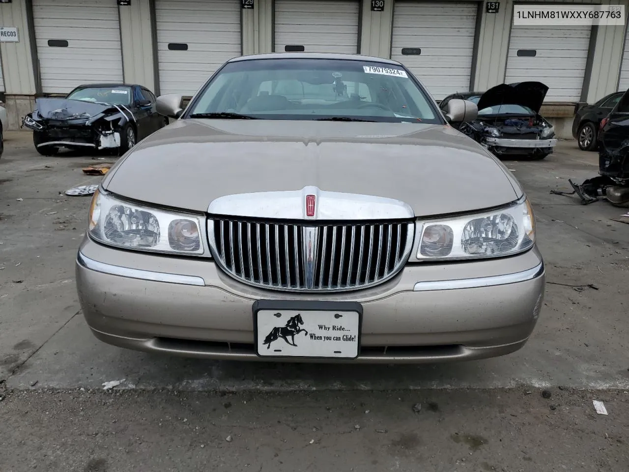 1999 Lincoln Town Car Executive VIN: 1LNHM81WXXY687763 Lot: 79079324