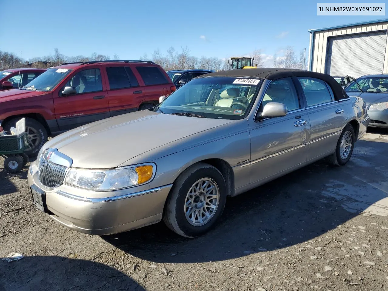 1999 Lincoln Town Car Signature VIN: 1LNHM82W0XY691027 Lot: 80047684