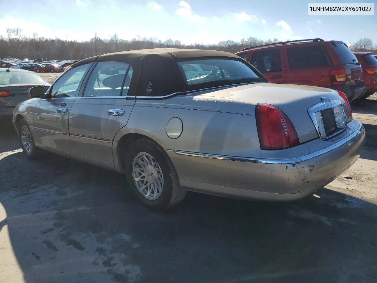 1999 Lincoln Town Car Signature VIN: 1LNHM82W0XY691027 Lot: 80047684