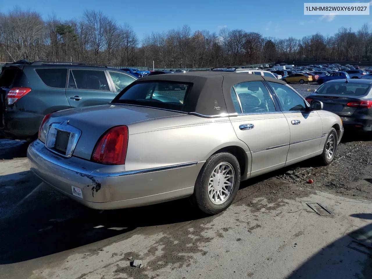 1999 Lincoln Town Car Signature VIN: 1LNHM82W0XY691027 Lot: 80047684