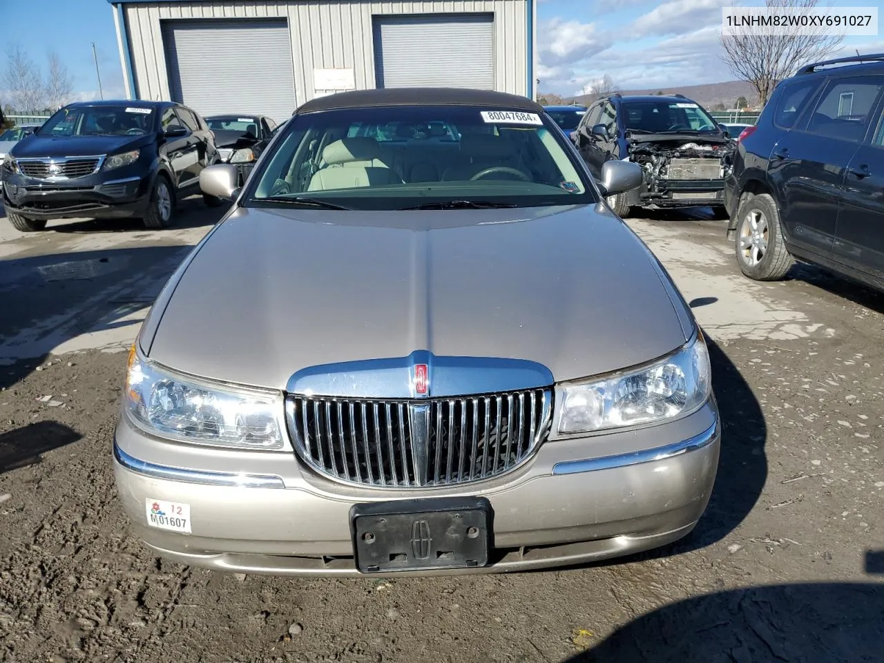 1999 Lincoln Town Car Signature VIN: 1LNHM82W0XY691027 Lot: 80047684