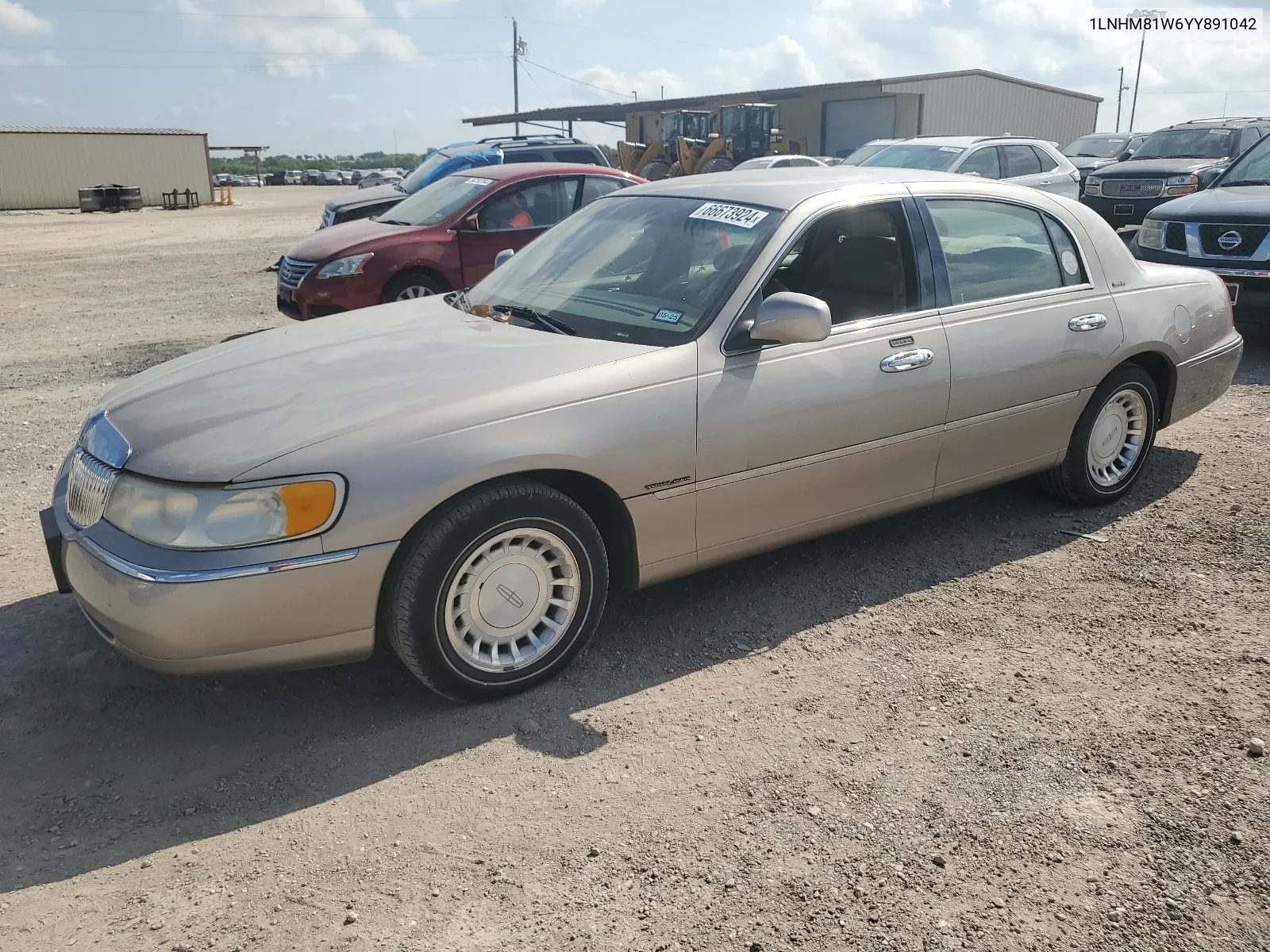 2000 Lincoln Town Car Executive VIN: 1LNHM81W6YY891042 Lot: 66673924