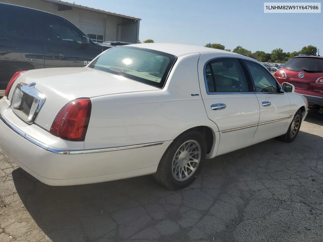 2001 Lincoln Town Car Signature VIN: 1LNHM82W91Y647986 Lot: 70456284