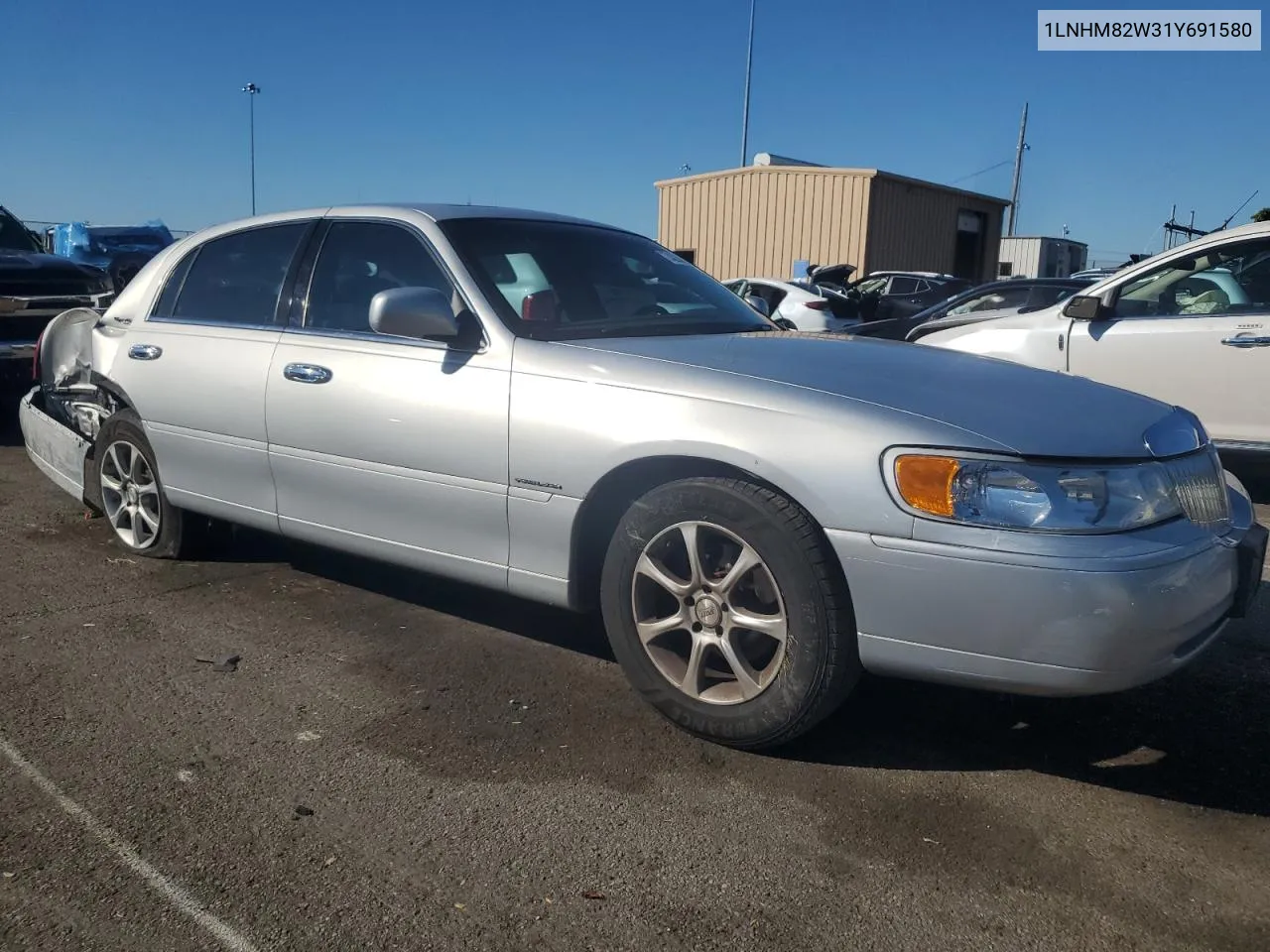 2001 Lincoln Town Car Signature VIN: 1LNHM82W31Y691580 Lot: 74223804