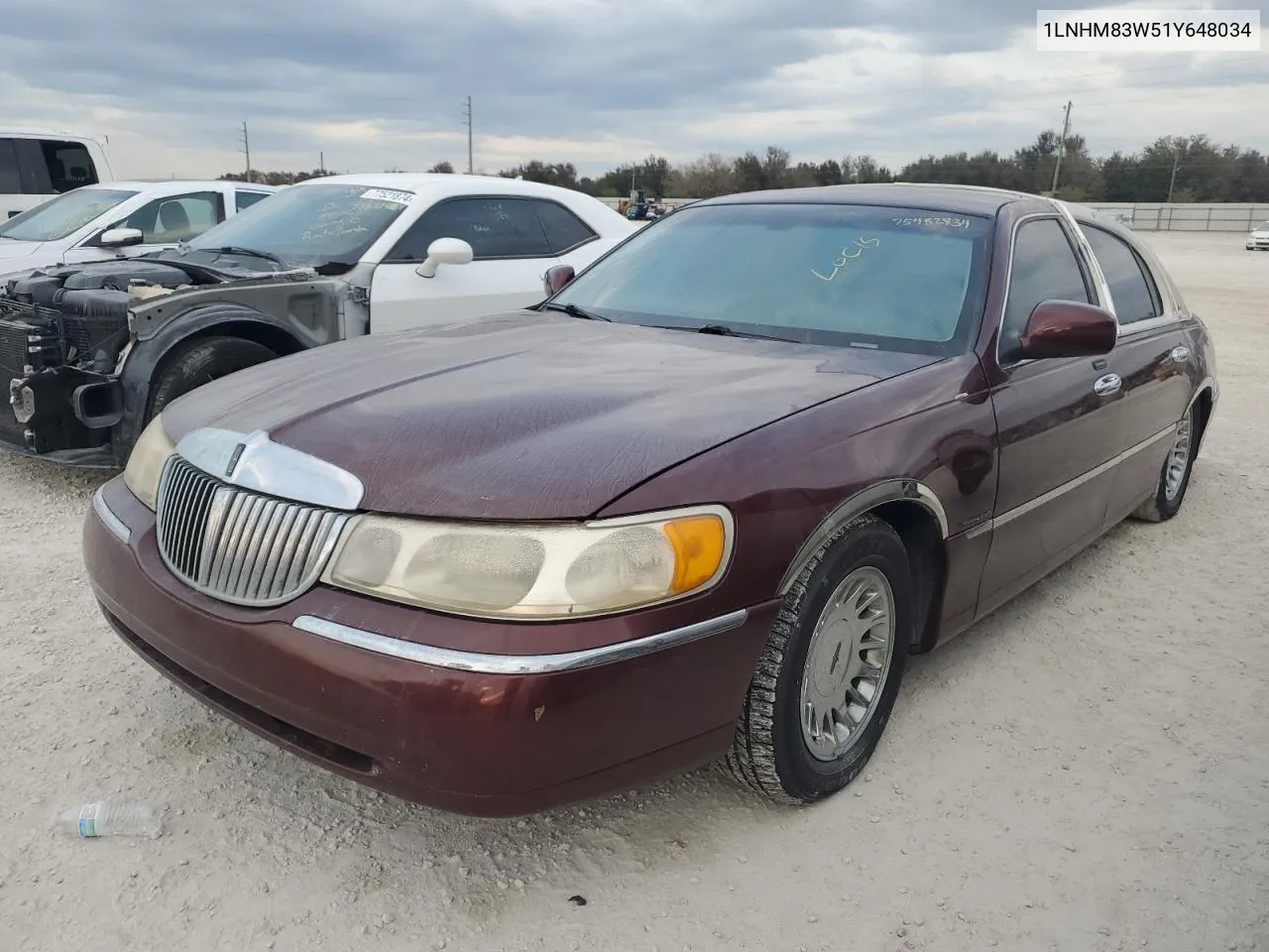 2001 Lincoln Town Car Cartier VIN: 1LNHM83W51Y648034 Lot: 75482834