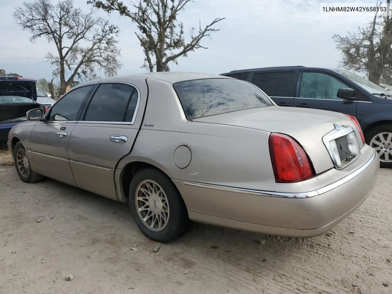 2002 Lincoln Town Car Signature VIN: 1LNHM82W42Y658153 Lot: 76549224