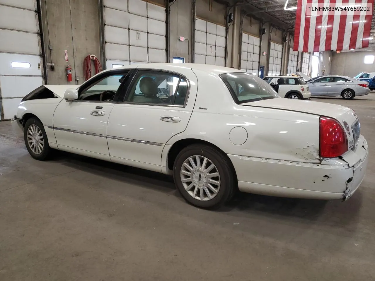 2004 Lincoln Town Car Ultimate VIN: 1LNHM83W54Y659202 Lot: 75670744