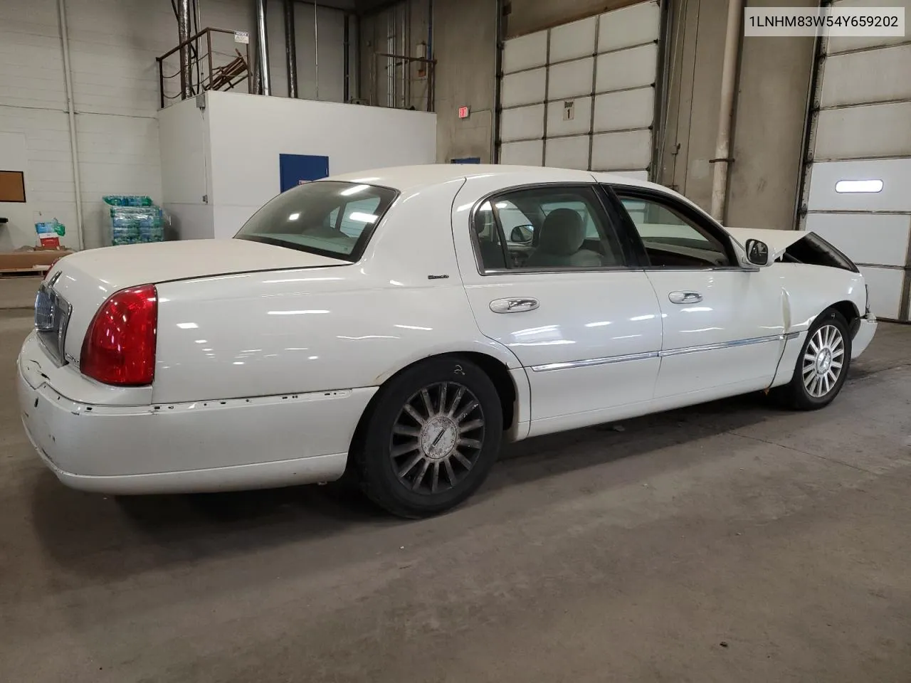 2004 Lincoln Town Car Ultimate VIN: 1LNHM83W54Y659202 Lot: 75670744