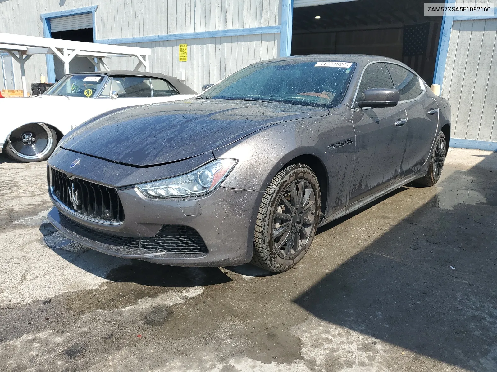 2014 Maserati Ghibli VIN: ZAM57XSA5E1082160 Lot: 64228824