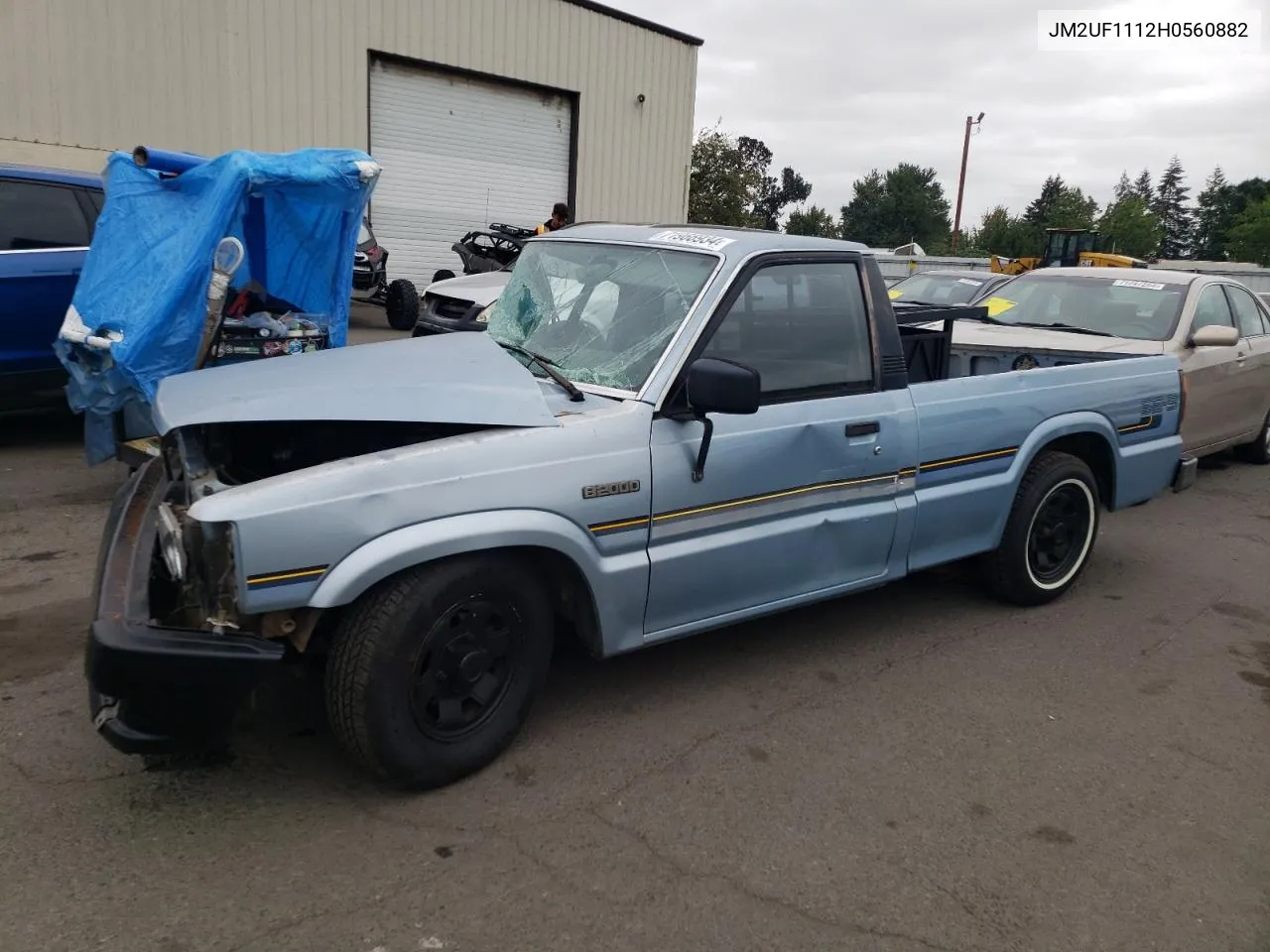 1987 Mazda B2000 VIN: JM2UF1112H0560882 Lot: 71966934