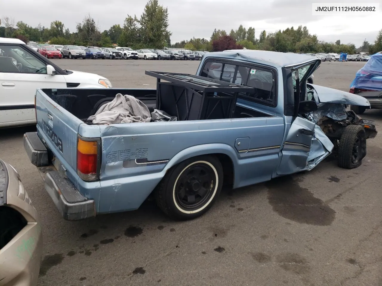 1987 Mazda B2000 VIN: JM2UF1112H0560882 Lot: 71966934