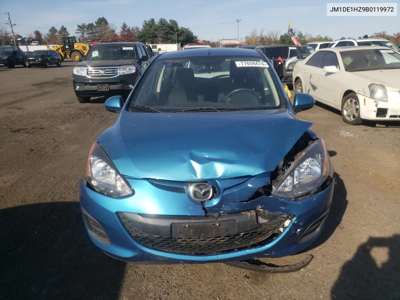 2011 Mazda Mazda2 VIN: JM1DE1HZ9B0119972 Lot: 77659474