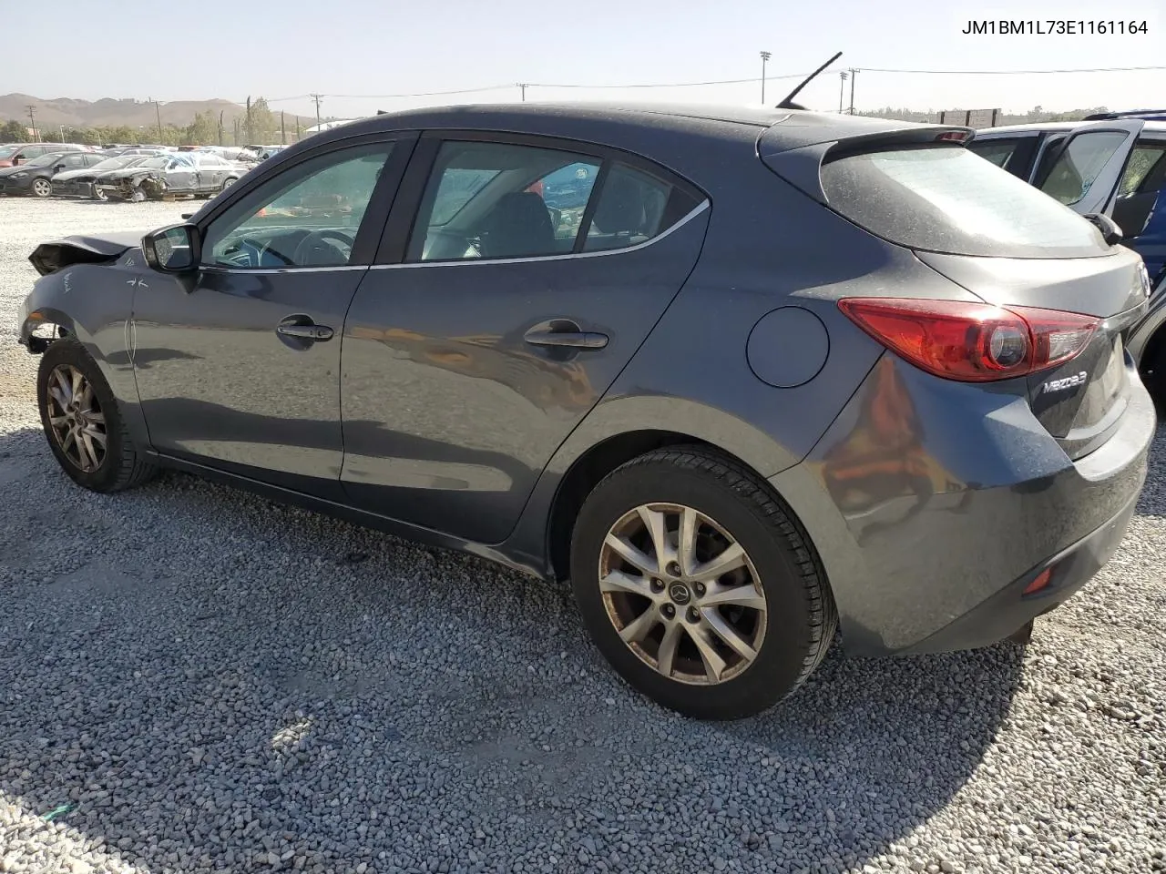 2014 Mazda 3 Touring VIN: JM1BM1L73E1161164 Lot: 76597264