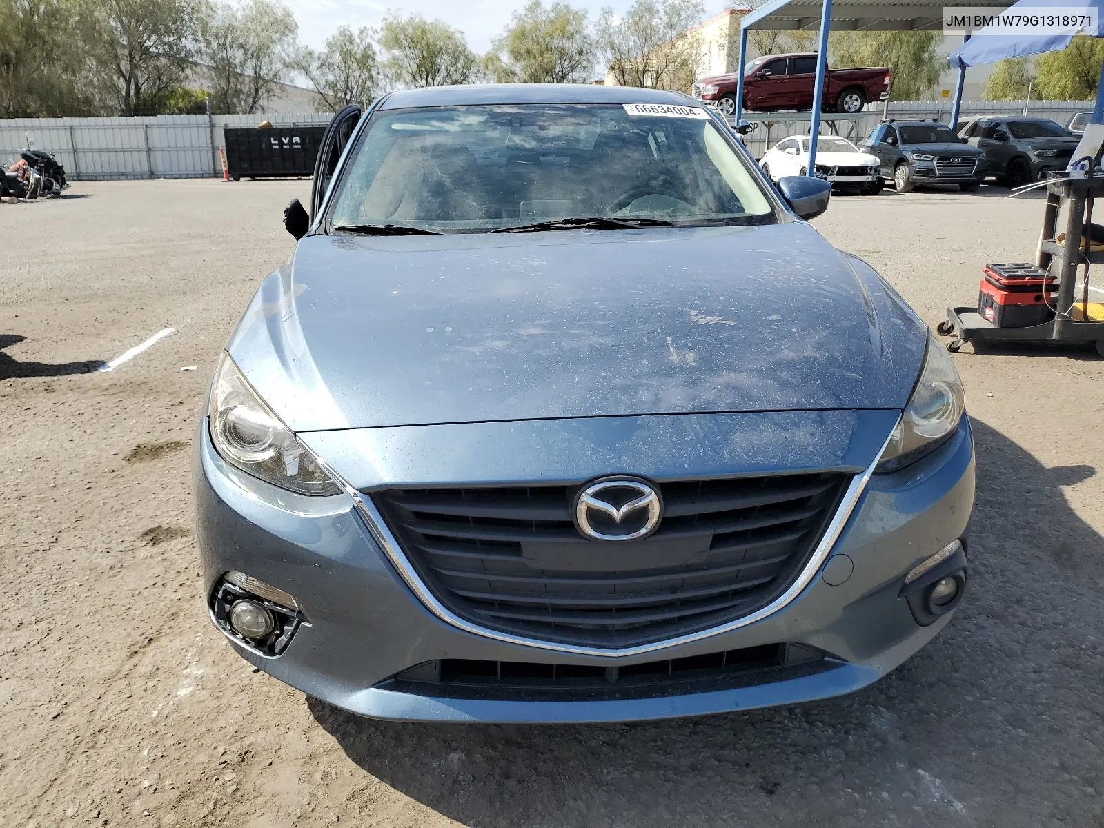 2016 Mazda 3 Touring VIN: JM1BM1W79G1318971 Lot: 66634004