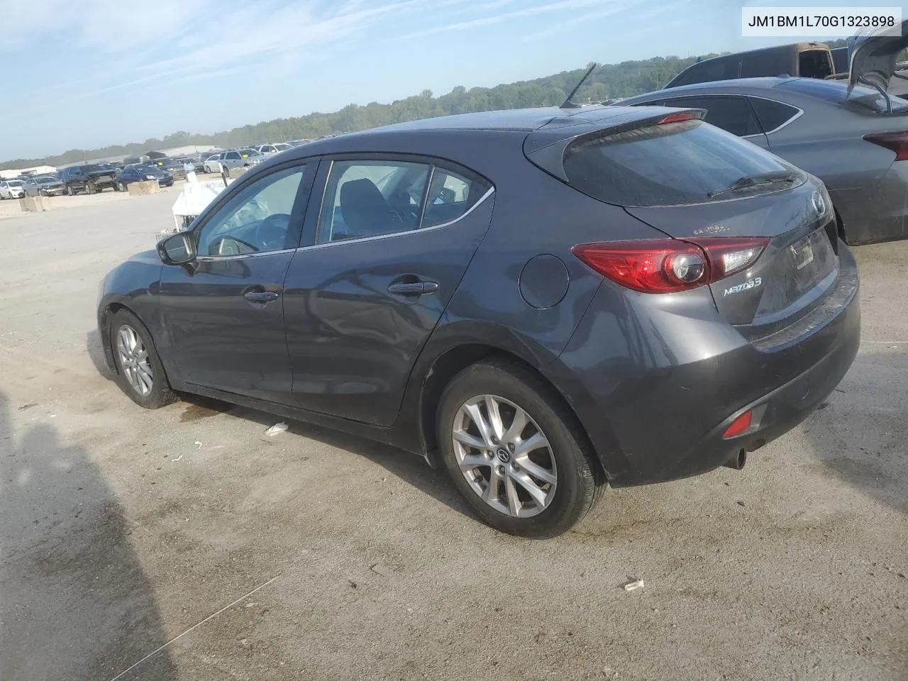 2016 Mazda 3 Touring VIN: JM1BM1L70G1323898 Lot: 72321384