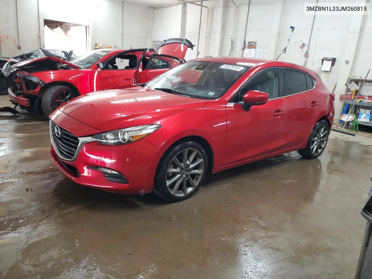 2018 Mazda 3 Touring VIN: 3MZBN1L33JM260815 Lot: 69228234