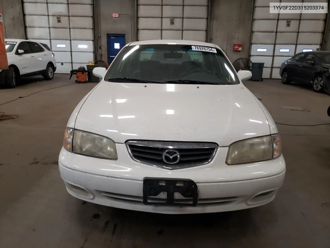 2001 Mazda 626 Es VIN: 1YVGF22D315203374 Lot: 76926754