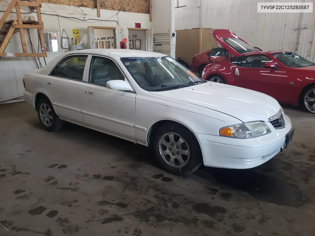 2002 Mazda 626 Lx VIN: 1YVGF22C125283587 Lot: 71278664