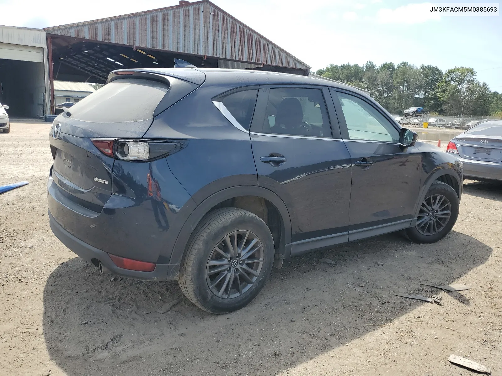 2021 Mazda Cx-5 Touring VIN: JM3KFACM5M0385693 Lot: 65689644