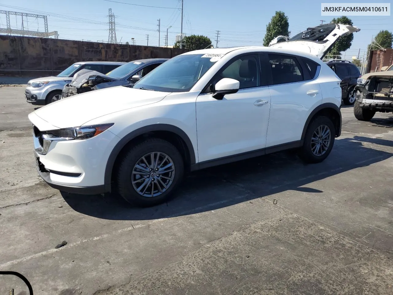 2021 Mazda Cx-5 Touring VIN: JM3KFACM5M0410611 Lot: 73605984