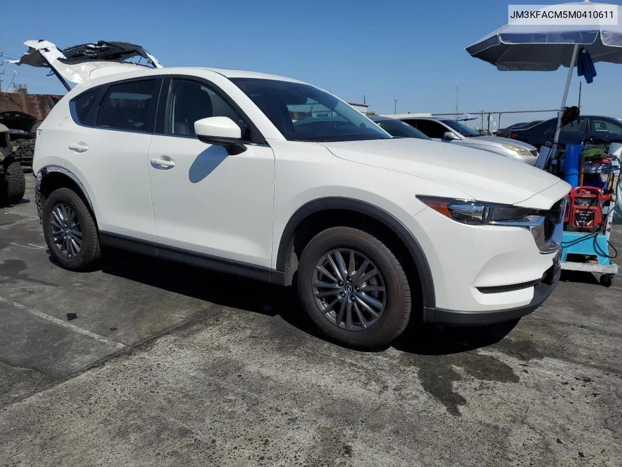 2021 Mazda Cx-5 Touring VIN: JM3KFACM5M0410611 Lot: 73605984