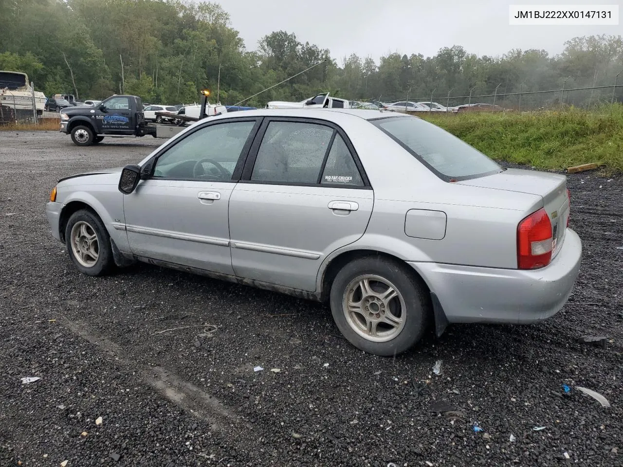 1999 Mazda Protege Dx VIN: JM1BJ222XX0147131 Lot: 72889094