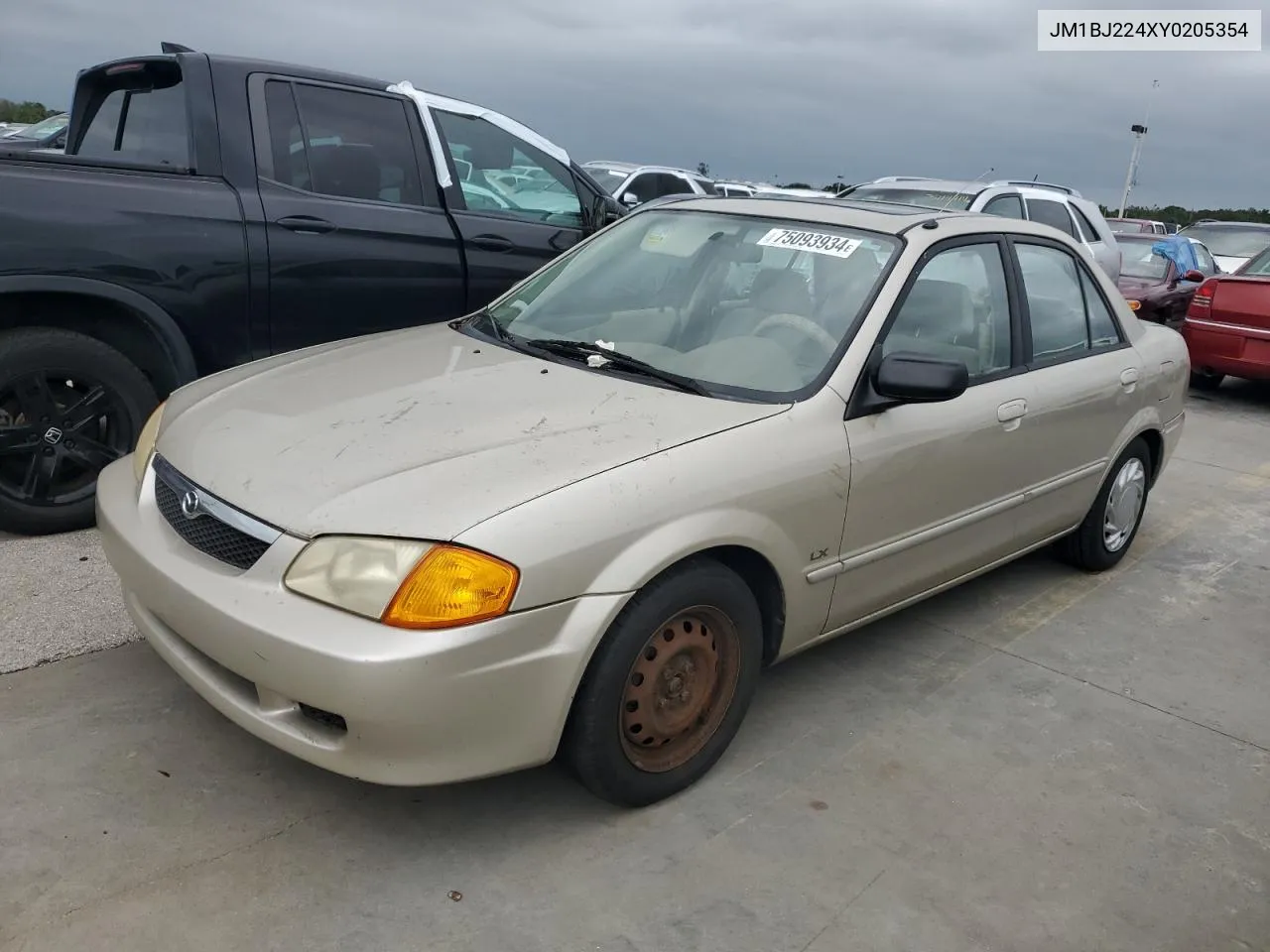 2000 Mazda Protege Dx VIN: JM1BJ224XY0205354 Lot: 75093934