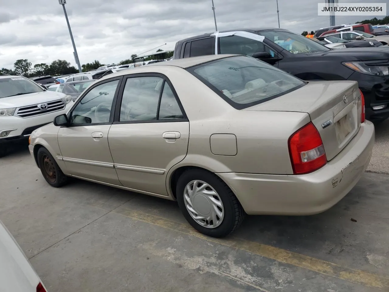 2000 Mazda Protege Dx VIN: JM1BJ224XY0205354 Lot: 75093934