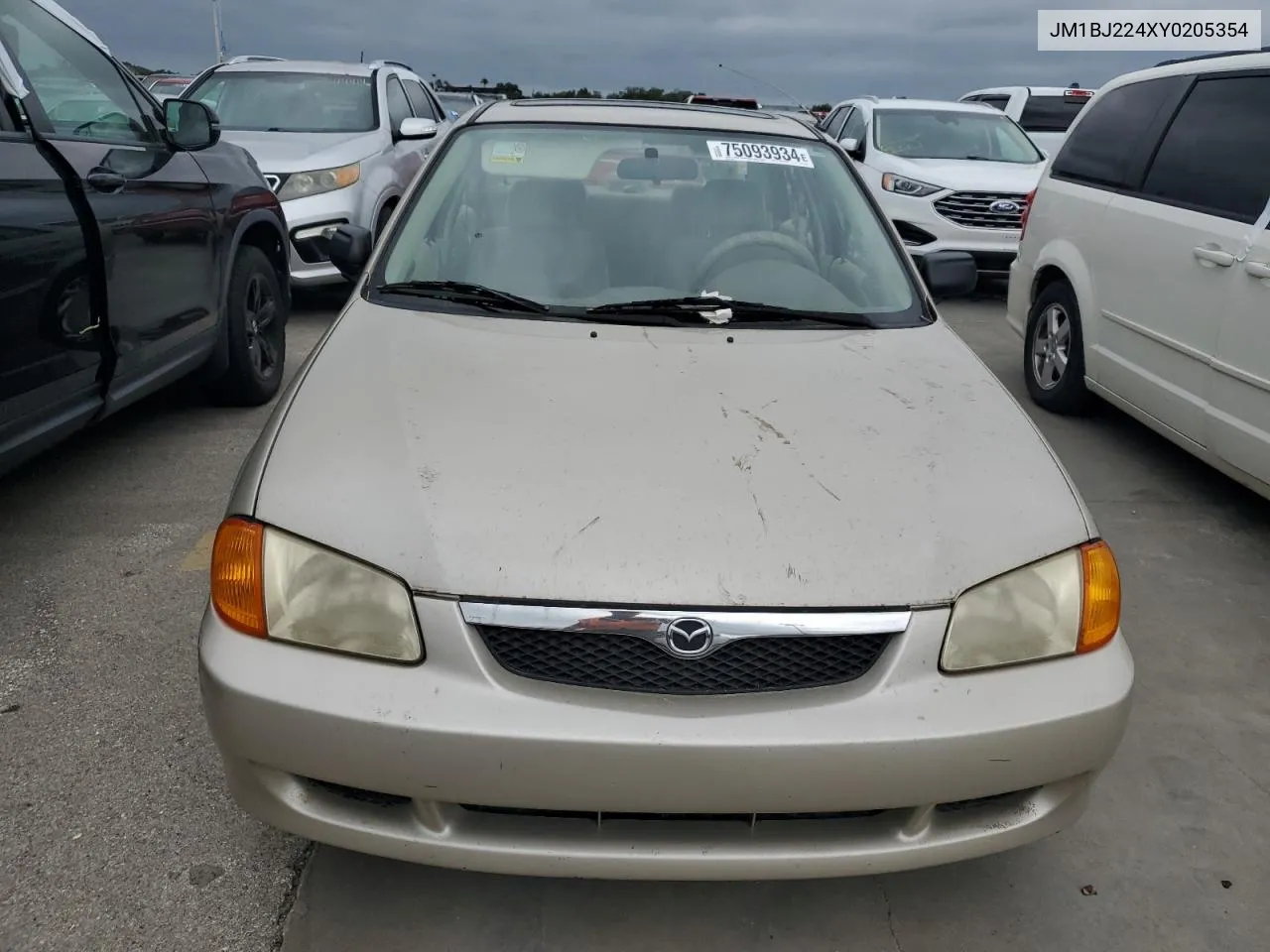 2000 Mazda Protege Dx VIN: JM1BJ224XY0205354 Lot: 75093934