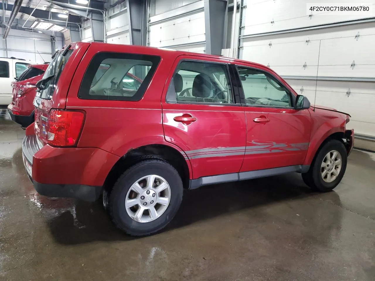 2011 Mazda Tribute I VIN: 4F2CY0C71BKM06780 Lot: 77748114