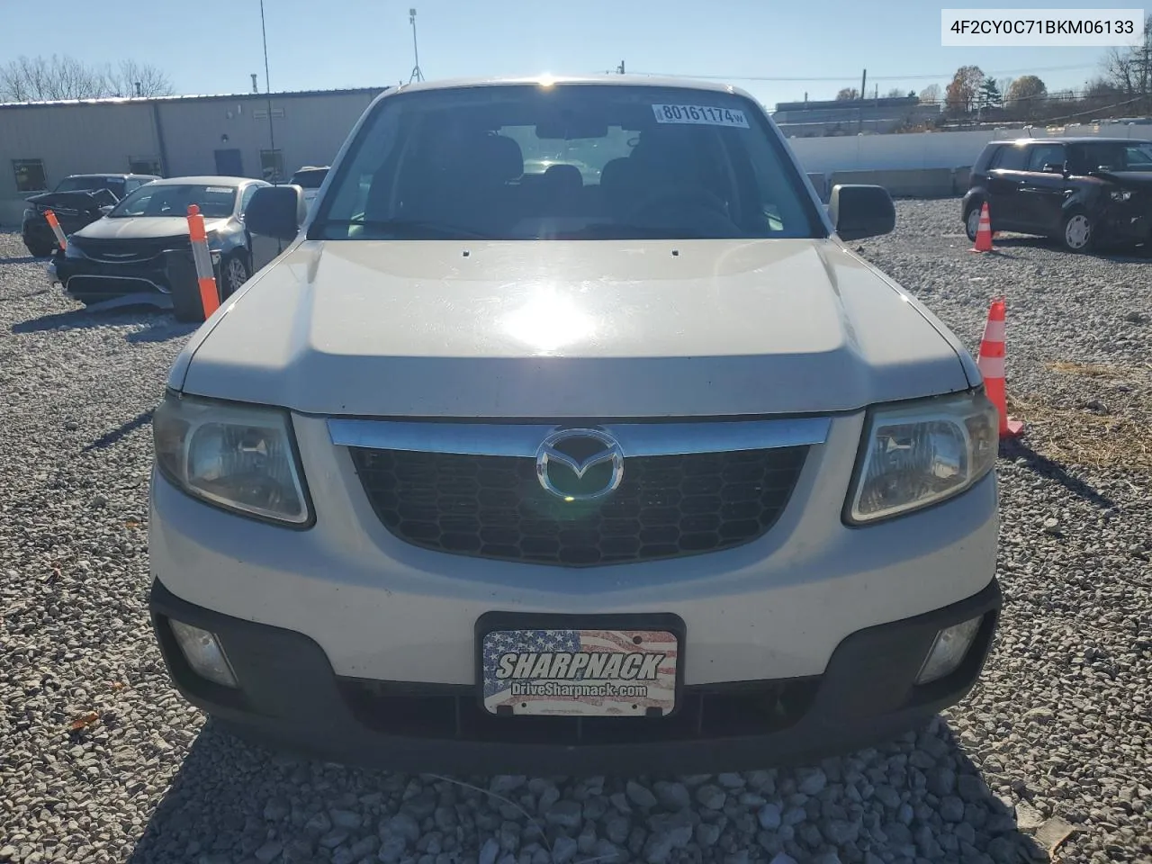 2011 Mazda Tribute I VIN: 4F2CY0C71BKM06133 Lot: 80161174