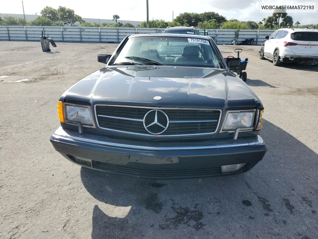 1991 Mercedes-Benz 560 Sec VIN: WDBCA45E6MA572193 Lot: 79191754