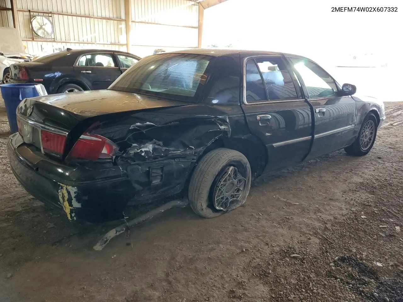 2002 Mercury Grand Marquis Gs VIN: 2MEFM74W02X607332 Lot: 67894054