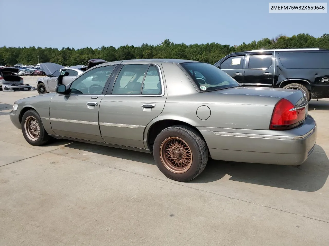 2002 Mercury Grand Marquis Ls VIN: 2MEFM75W82X659645 Lot: 70977404