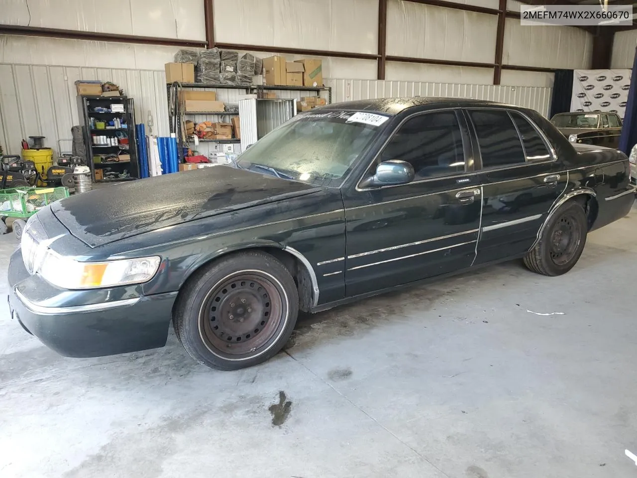 2002 Mercury Grand Marquis Gs VIN: 2MEFM74WX2X660670 Lot: 72708104