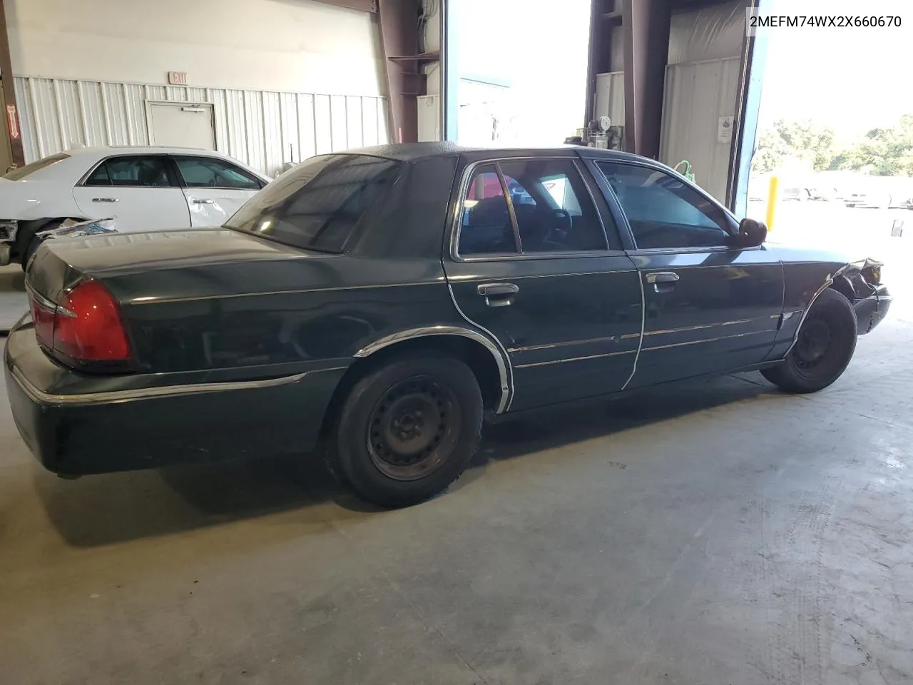 2002 Mercury Grand Marquis Gs VIN: 2MEFM74WX2X660670 Lot: 72708104