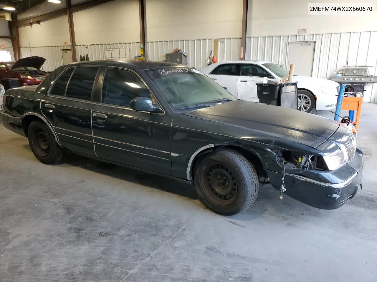 2002 Mercury Grand Marquis Gs VIN: 2MEFM74WX2X660670 Lot: 72708104