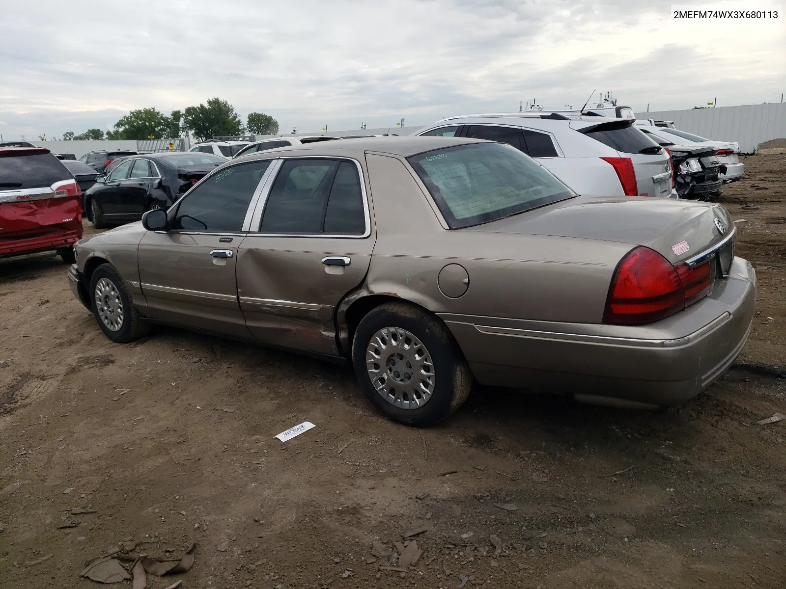 2003 Mercury Grand Marquis Gs VIN: 2MEFM74WX3X680113 Lot: 65446864