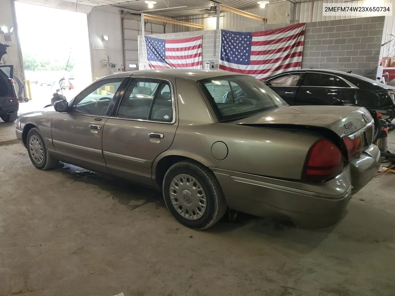 2003 Mercury Grand Marquis Gs VIN: 2MEFM74W23X650734 Lot: 66419434