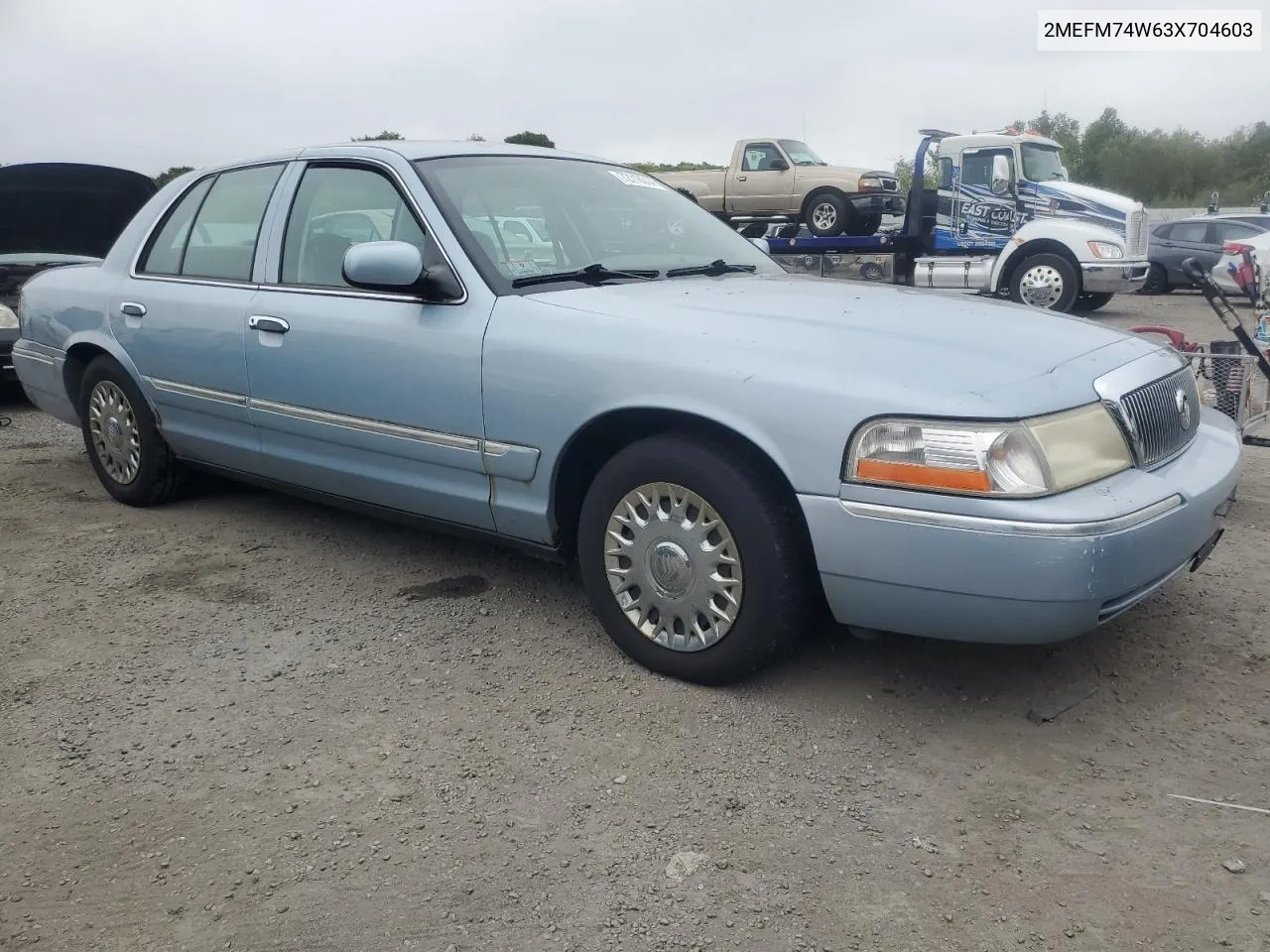 2003 Mercury Grand Marquis Gs VIN: 2MEFM74W63X704603 Lot: 72118014