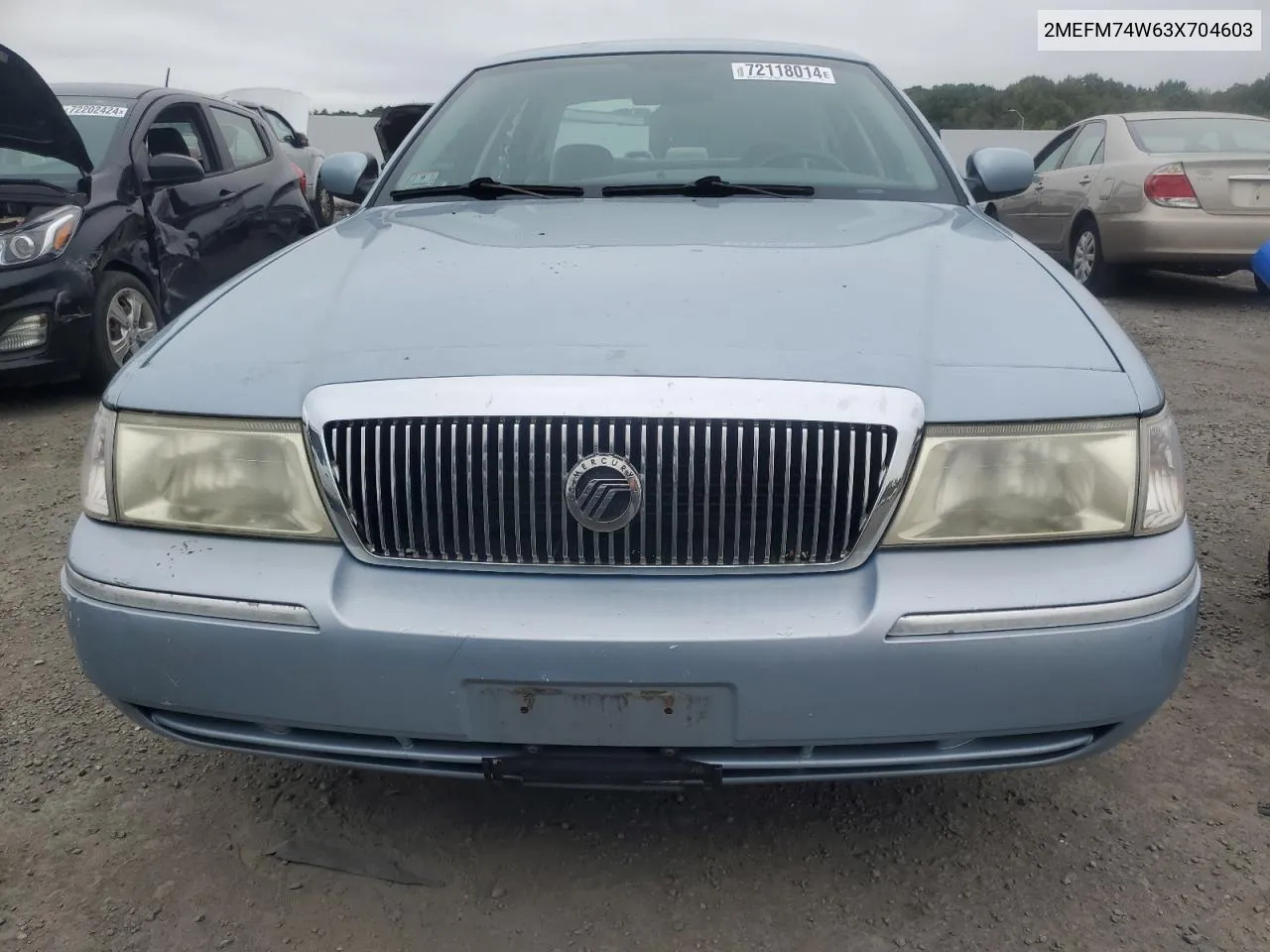 2003 Mercury Grand Marquis Gs VIN: 2MEFM74W63X704603 Lot: 72118014