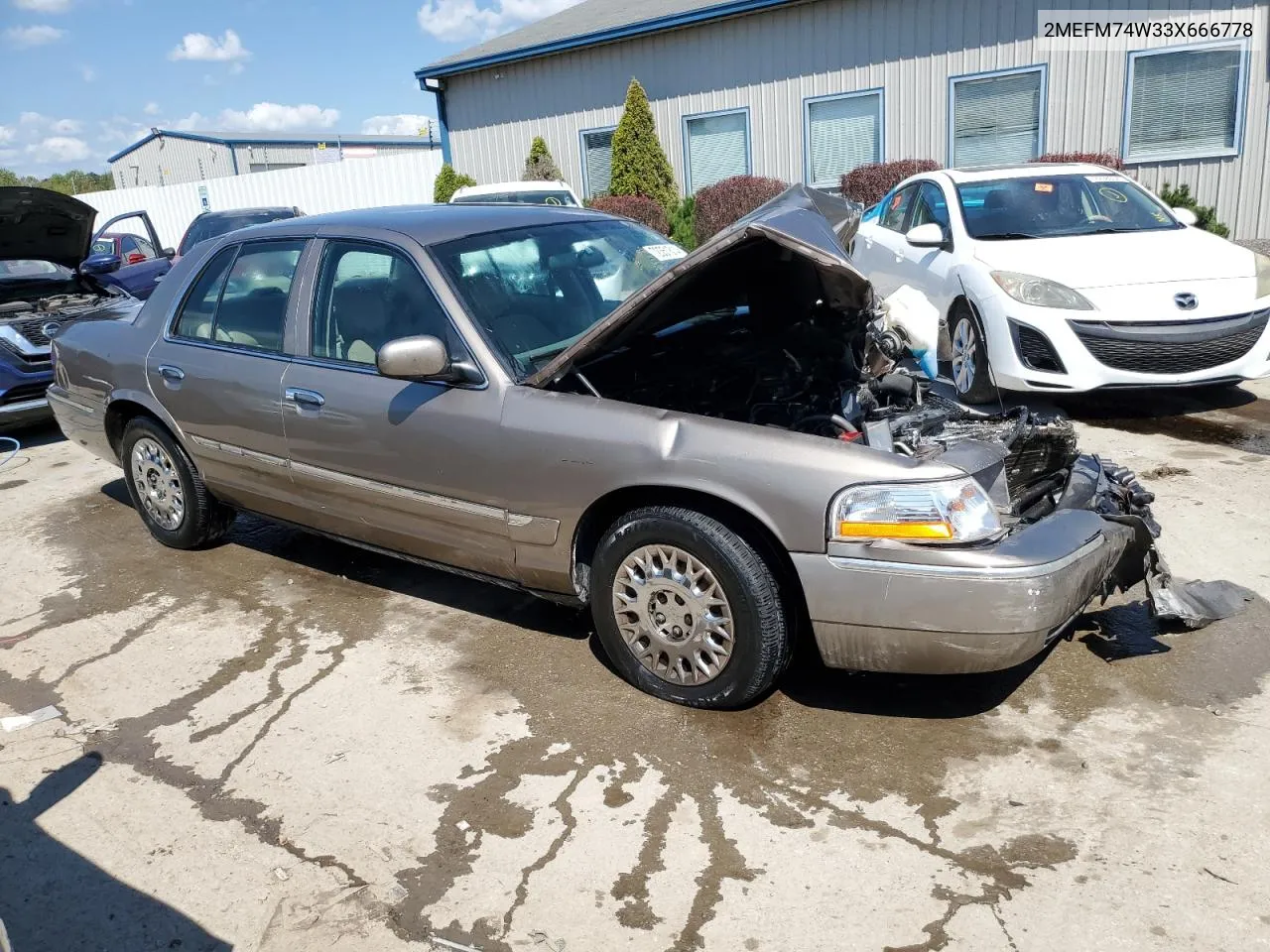 2003 Mercury Grand Marquis Gs VIN: 2MEFM74W33X666778 Lot: 72351814