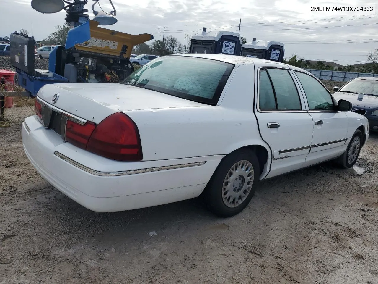 2003 Mercury Grand Marquis Gs VIN: 2MEFM74W13X704833 Lot: 74727834