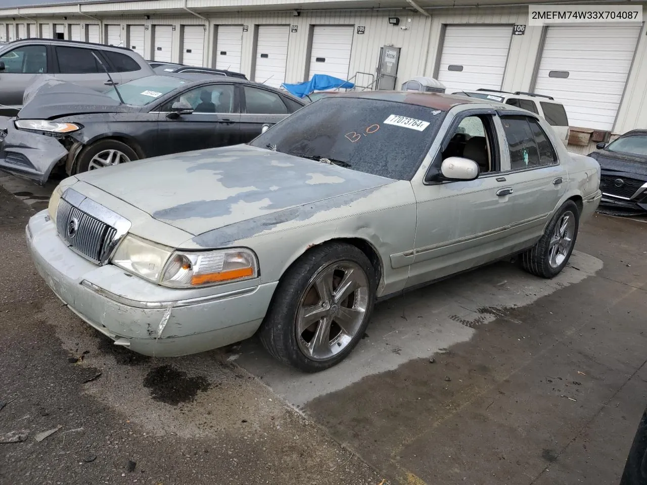 2003 Mercury Grand Marquis Gs VIN: 2MEFM74W33X704087 Lot: 77073764