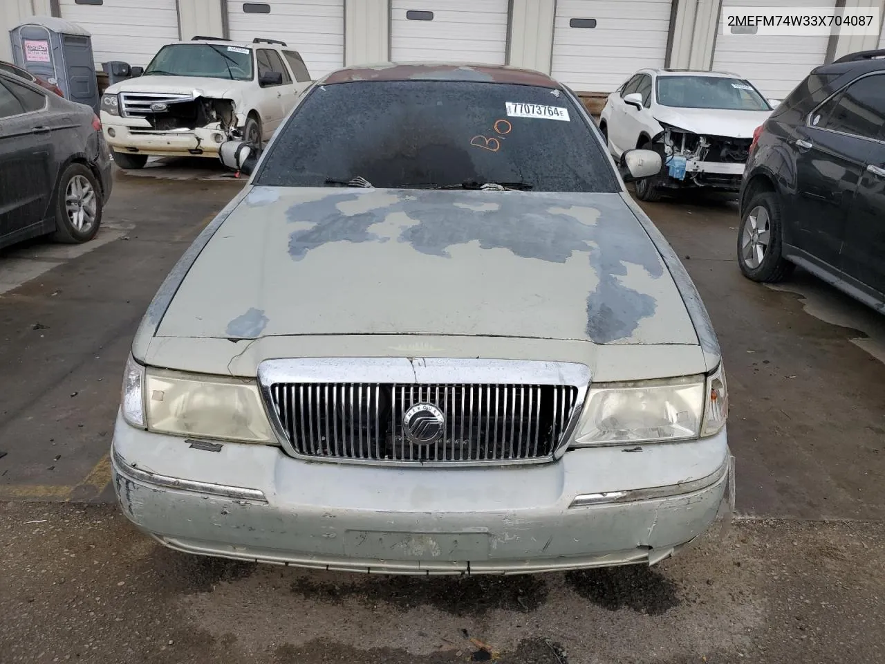 2003 Mercury Grand Marquis Gs VIN: 2MEFM74W33X704087 Lot: 77073764