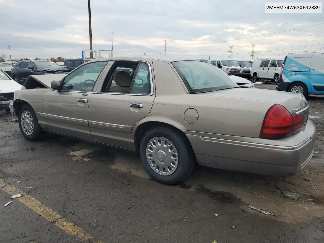 2003 Mercury Grand Marquis Gs VIN: 2MEFM74W63X692839 Lot: 77187544