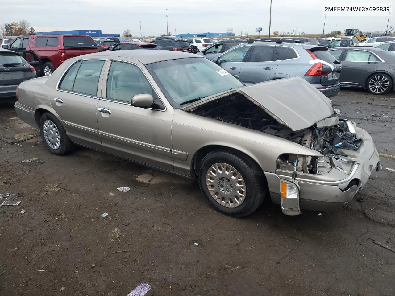 2003 Mercury Grand Marquis Gs VIN: 2MEFM74W63X692839 Lot: 77187544