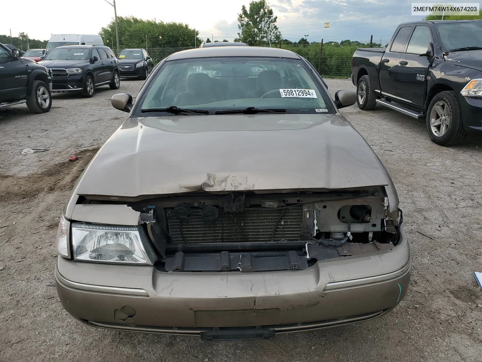 2004 Mercury Grand Marquis Gs VIN: 2MEFM74W14X674203 Lot: 59812994