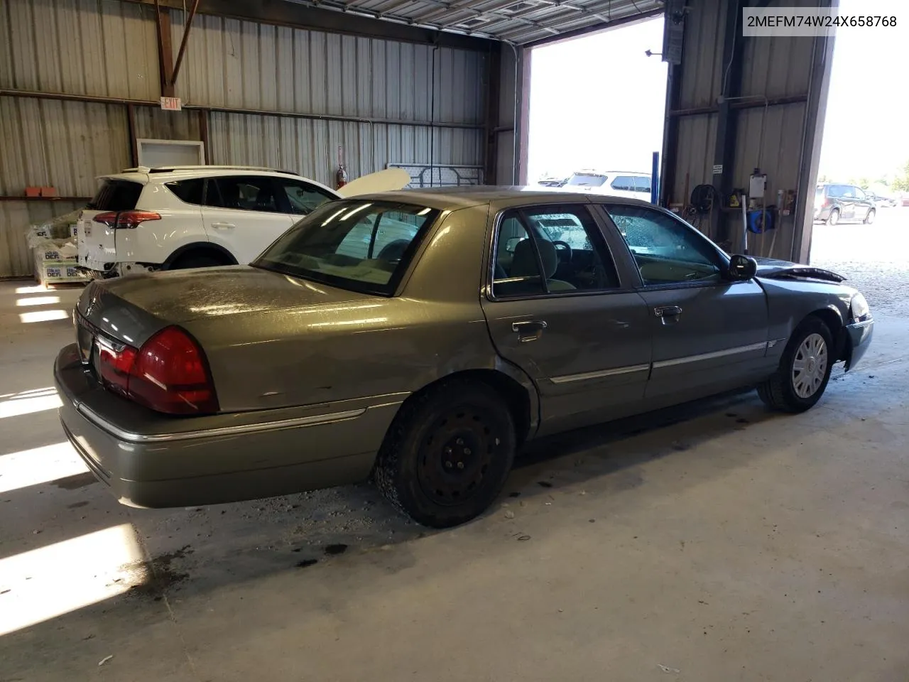 2004 Mercury Grand Marquis Gs VIN: 2MEFM74W24X658768 Lot: 64211294