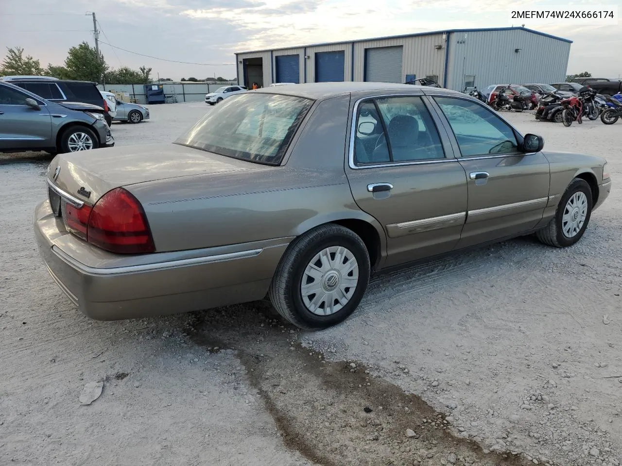 2004 Mercury Grand Marquis Gs VIN: 2MEFM74W24X666174 Lot: 68008384